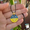 Кулони Герб України. Слава нації. Тризуб. Колір золото Кольори прапор України. На чорному шнурку